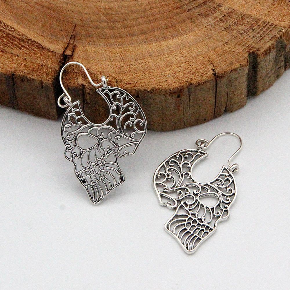Creative Vintage Openwork Carved Skull Earrings